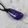 Sugilite Drilled Tumblestone with Cord  ~27x13mm