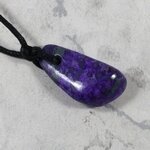 Sugilite Drilled Tumblestone with Cord  ~27x13mm