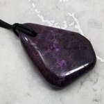 Sugilite Drilled Tumblestone with Cord  ~37x28mm