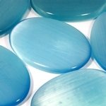 Turquoise Cat's Eye Palm Stone ~70x50mm