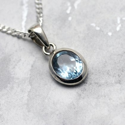 Blue Topaz & Silver Pendant - Faceted Oval 12mm
