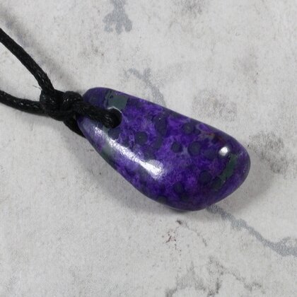 Sugilite Drilled Tumblestone with Cord  ~27x13mm