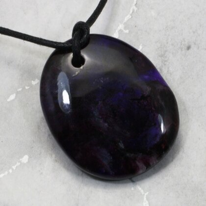 Sugilite Drilled Tumblestone with Cord  ~35mm