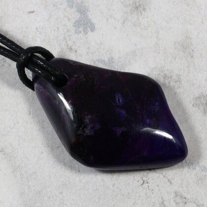 Sugilite Drilled Tumblestone with Cord  ~35x22mm