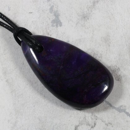 Sugilite Drilled Tumblestone with Cord  ~40x22mm