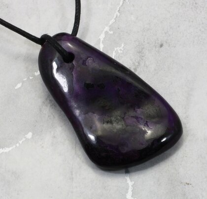 Sugilite Drilled Tumblestone with Cord  ~47mm