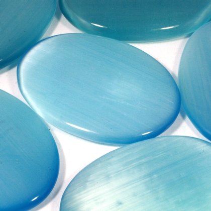 Turquoise Cat's Eye Palm Stone ~70x50mm